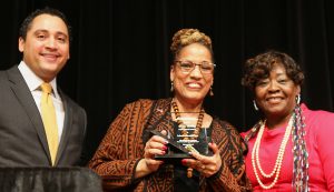 Above, from left, State Assemblyman Robert Rodriguez, CSEA Statewide Secretary Denise Berkley, and State Assemblywoman Crystal Peoples-Stokes honor Berkley as Labor Leader of the Year during the Labor Luncheon at the NYS Association of Black and Puerto Rican Legislators Caucus.