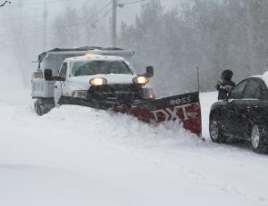 Village of Cornwall-on-Hudson highway workers clear a village street.