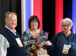 Central Region PEOPLE Award CSEA President Danny Donohue, left, and CSEA Executive Vice President Mary E. Sullivan, right, present the PEOPLE Cup to the Central Region. Region President Colleen Wheaton accepted on behalf of the region.