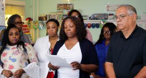 CSEA/VOICE Chapter Representative Cynthia Bolding reads a statement from a parent from her program who cannot afford the steep parent copays that Astorino repeatedly raised during his tenure. She is joined by Southern Region President Billy Riccaldo who came to offer support.