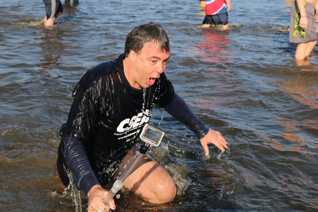 CNY DDSO activist Barry Richards reacts after plunging face-first into the water.