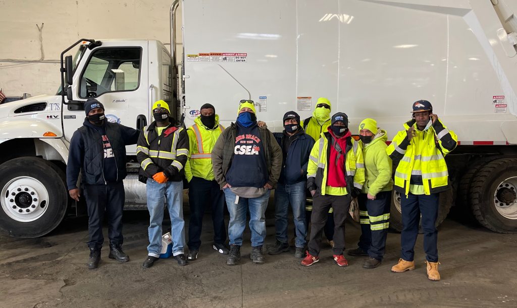 Our new CSEA members are happy to be part of their new union family. From left, Devin Parker, Claude Dover, Terrence Moon, Frankie Alvarado, Willy Cerquin, Jeorking Welker, Greg Booker, Carlos Silva and Steve Jones.