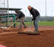 Town of Ramapo Unit members Gregory Mann, left, and Michael Lomelino prepare a bullpen at Palisades Credit Union Park.