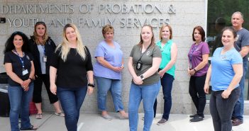 Schenectady County probation officers gather recently in front of their Broadway office building. From left, Angie De Carlo, Carrie Schnoop, Erikka Burns, Mary Redmond, Shannon Corcoran, Patty Corcoran, Dana Gannon, Katie Marra and Jim Wolff.