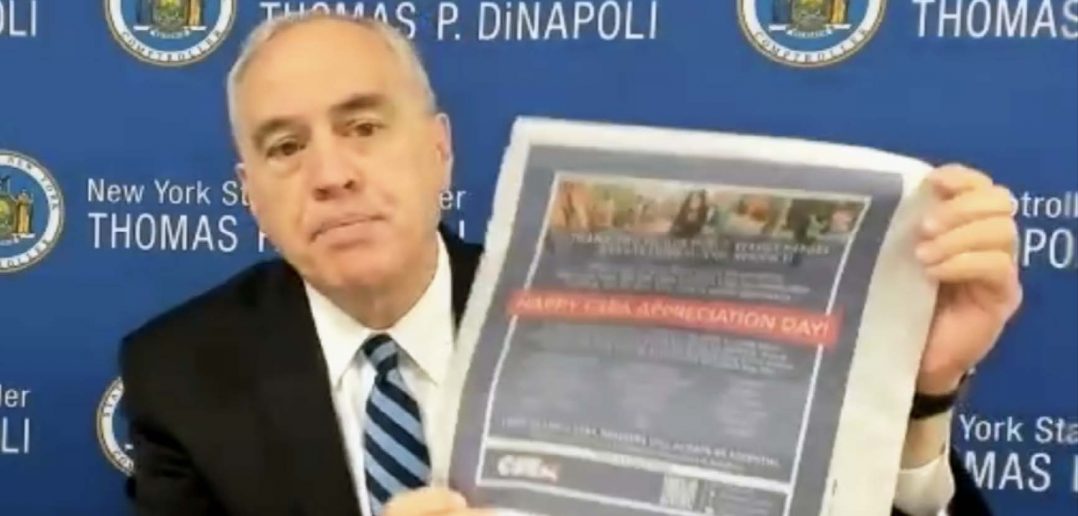 State Comptroller Thomas DiNapoli, meeting virtually with the Retiree Executive Committee, holds up a newspaper ad touting the essential services of CSEA members to show his own appreciation of CSEA members.