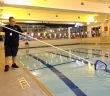 Person_cleaning_indoor_pool