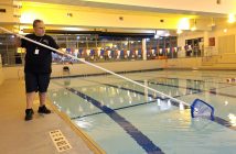 Person_cleaning_indoor_pool