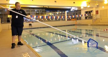 Person_cleaning_indoor_pool