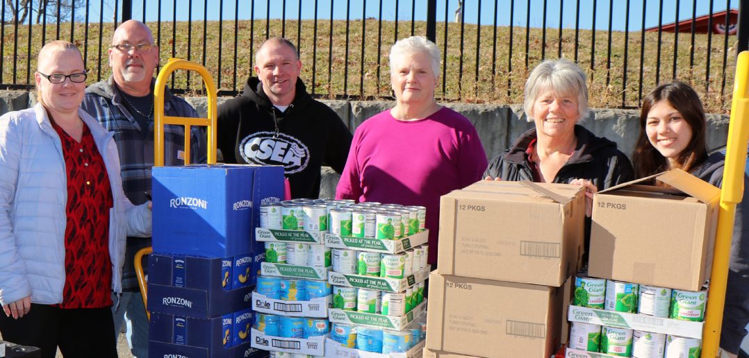 Southern Region state correctional facility local officers worked together to coordinate an overwhelmingly successful Thanksgiving food drive for veterans who use the Castle Point VA Medical Center food pantry. Pictured are, from left, Sullivan Correctional Facility Local President Nikki Wallace, Bedford Hills Correctional Facility Local Treasurer Chris Martin, Bedford Hills Correctional Facility Local President George Beekman, Ulster Correctional Facility Local President Linda White, Woodbourne Correctional Facility Local President Bonnie Huebsch, and Juliana Martinez, Huebsch’s granddaughter.