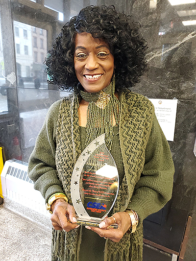 Image of Dutchess County Unit member Melody Newton with award.