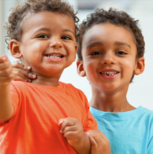 Image of young children smiling