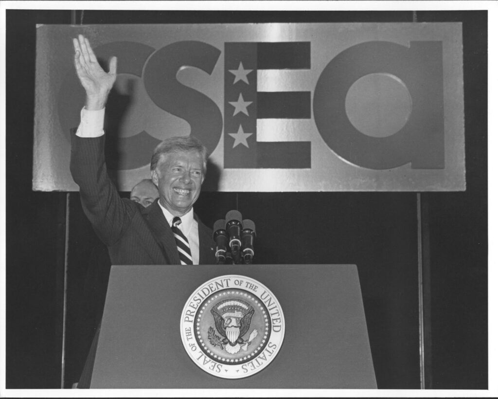 President Jimmy Carter waves to CSEA delegates in 1980.