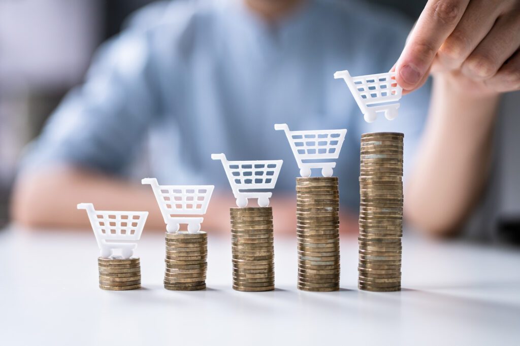 Image_of_person_placing_shopping_carts_on_coins