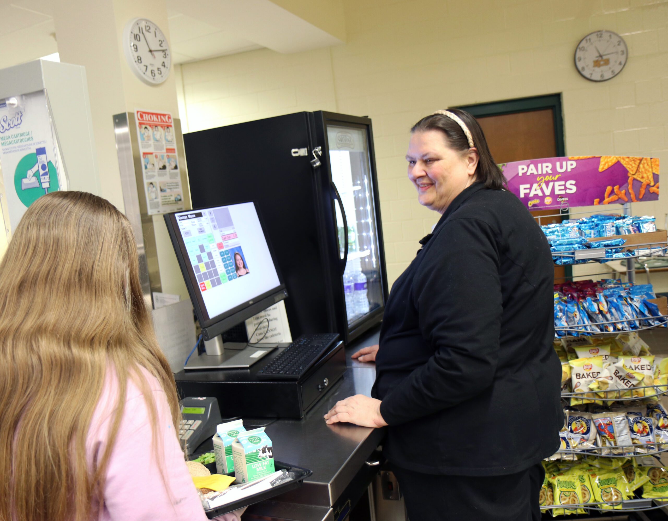 Image_of_woman_at_register_in_school_cafeteria